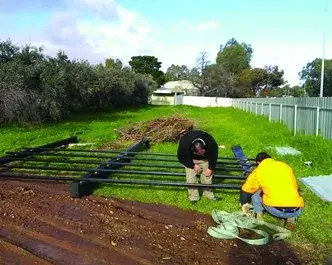 men fabricating metal